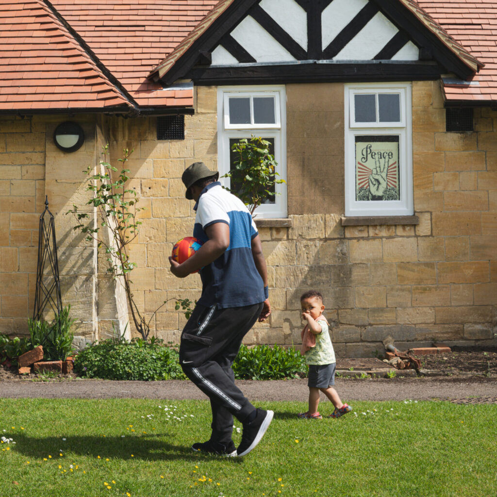 Almshouse father and child playing