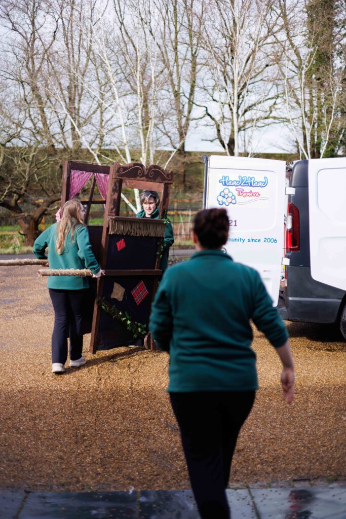 Loading theatre equipment in Head2Head Sensory Theatre van